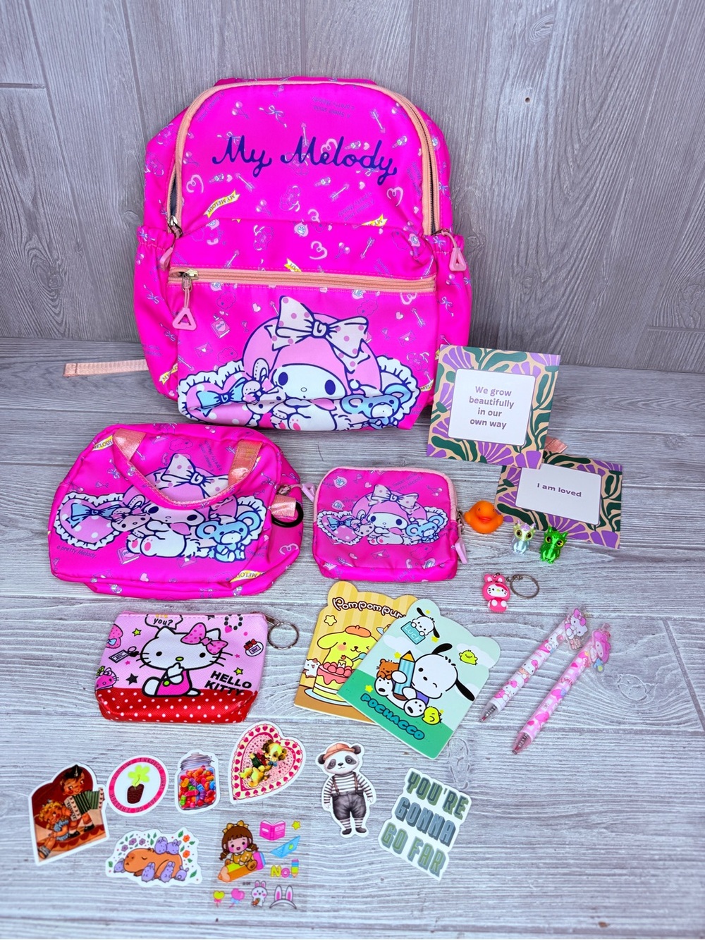 My melody back pack bundle change purse stickers keychain dragon pens paper duck